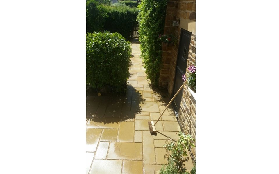 New garden path complete with broom!